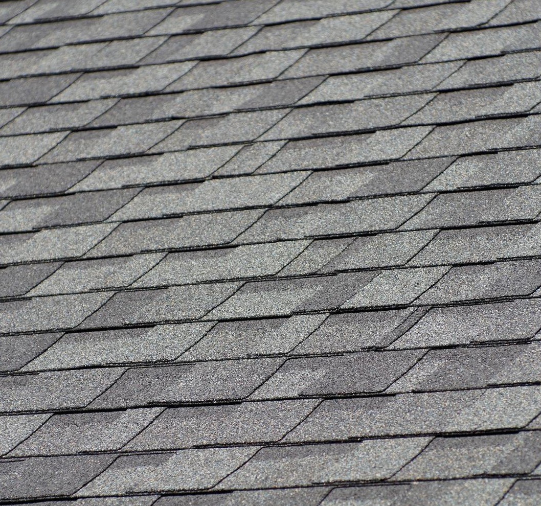 Asphalt roofing shingles - purpose to show the types of materials we work with on our roofing projects.